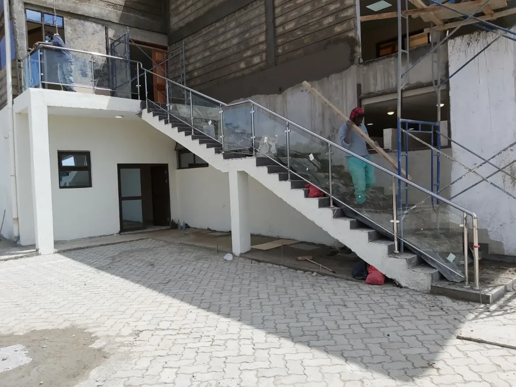 Stainless Steel Railings - stainless steel and glass railing installation 3 by Wits Concepts